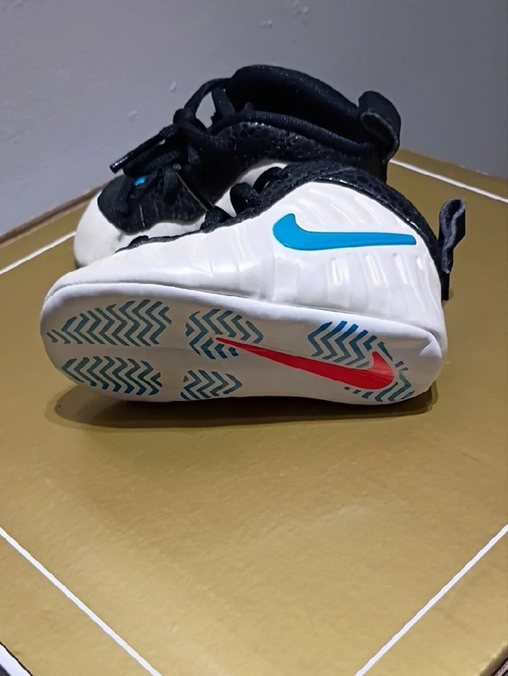 Nike Black and White Baby Walker Sneakers with Blue and Red Accents